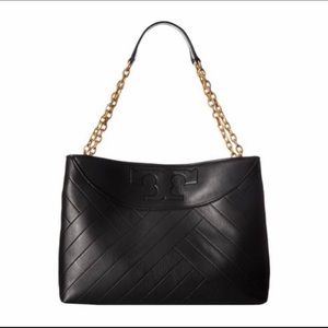 Black leather slouchy TB bag